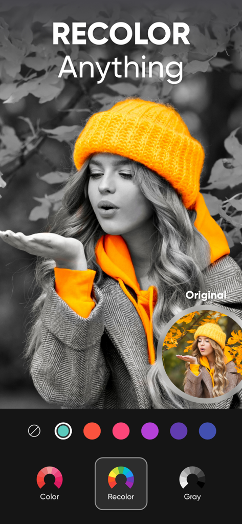 A photo of a woman in a bright orange beanie using the selective color and recolor tool against a black and white background