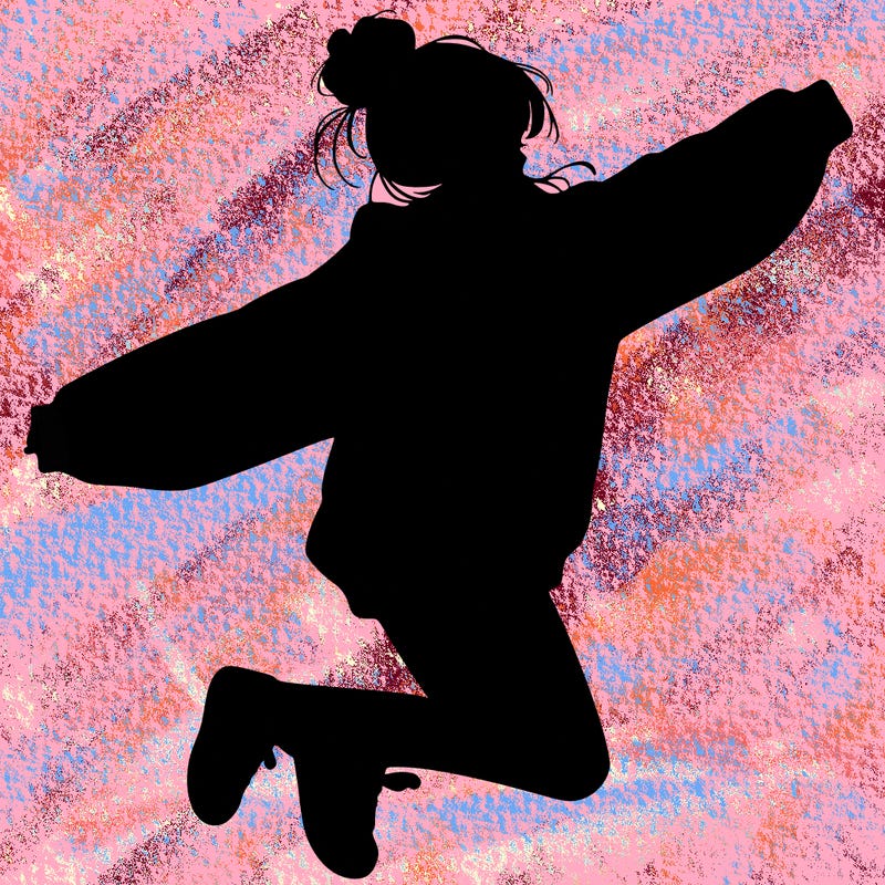 realistic girl jumping with a bun and oversized sweatshirt