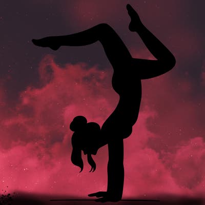 a woman doing a handstand