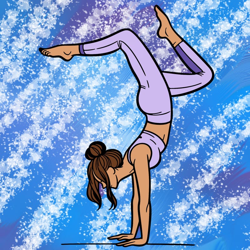 a woman doing a handstand