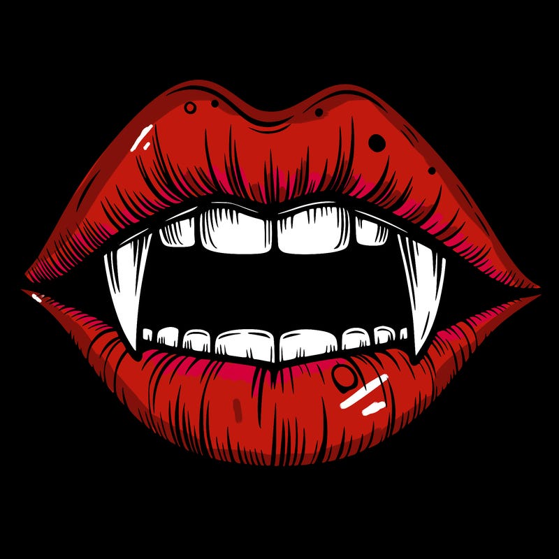 lips with vampire teeth
