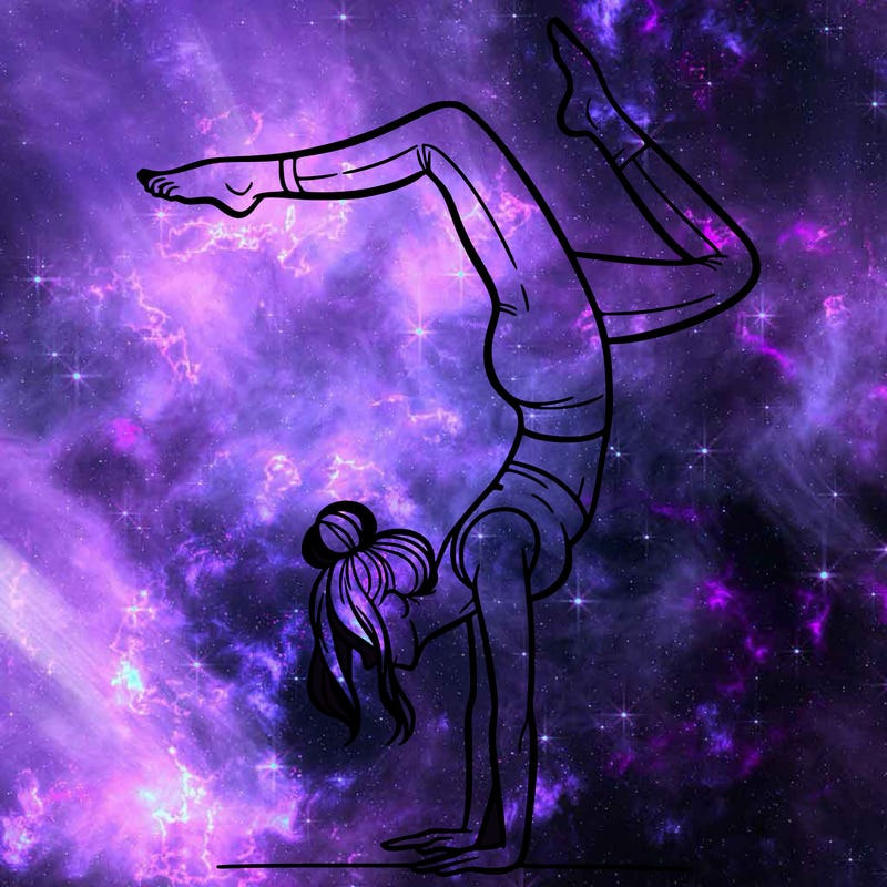 a woman doing a handstand