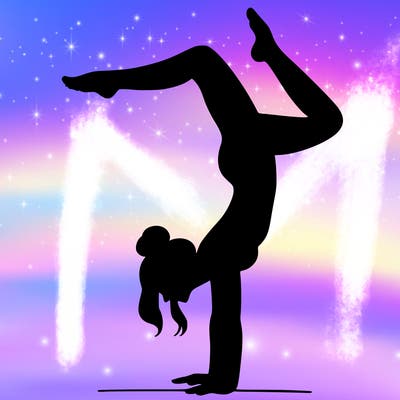 a woman doing a handstand