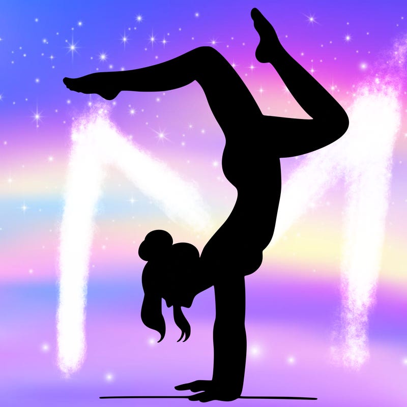 a woman doing a handstand