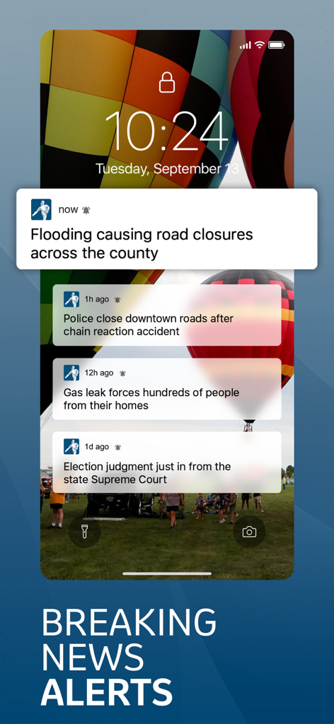 Journal Star - iPhone lock screen displaying local breaking news notifications from the Lincoln Journal Star app
