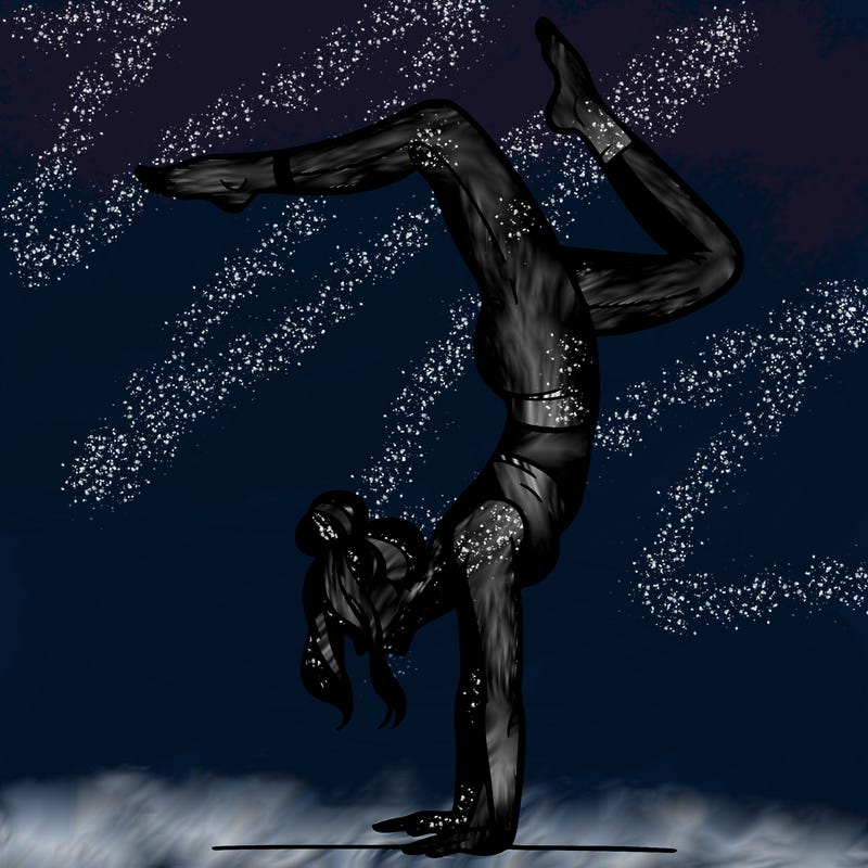 a woman doing a handstand