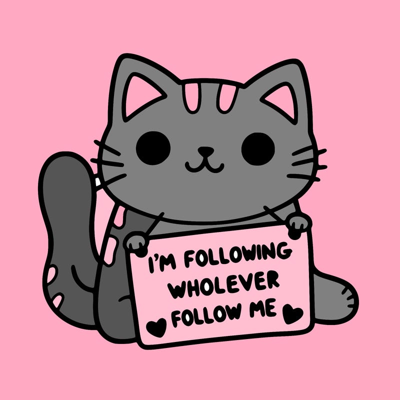 cat with a sign that says i’m following whoever follows me