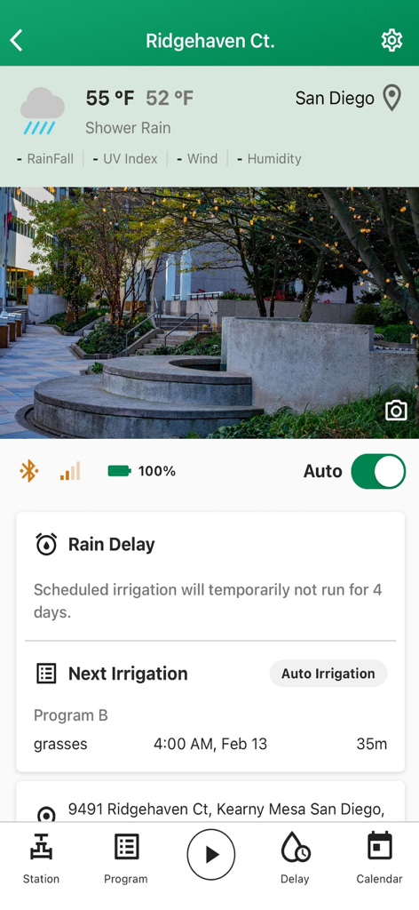 Rain Bird 2.0 mobile app interface showing a rain delay status and the next irrigation schedule for a property in San Diego.