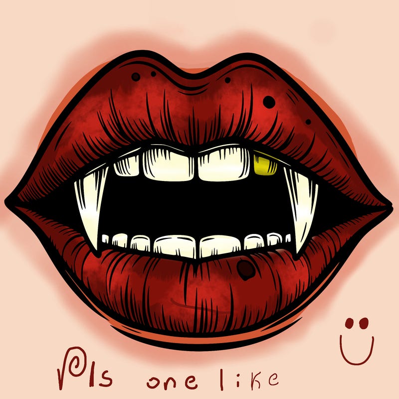 lips with vampire teeth