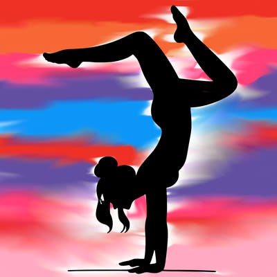 a woman doing a handstand