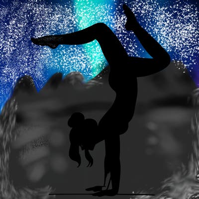 a woman doing a handstand