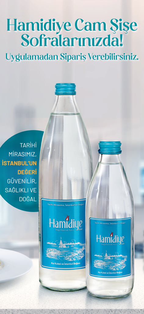 Two premium glass water bottles with blue labels from the Hamidiye Su mobile delivery app.