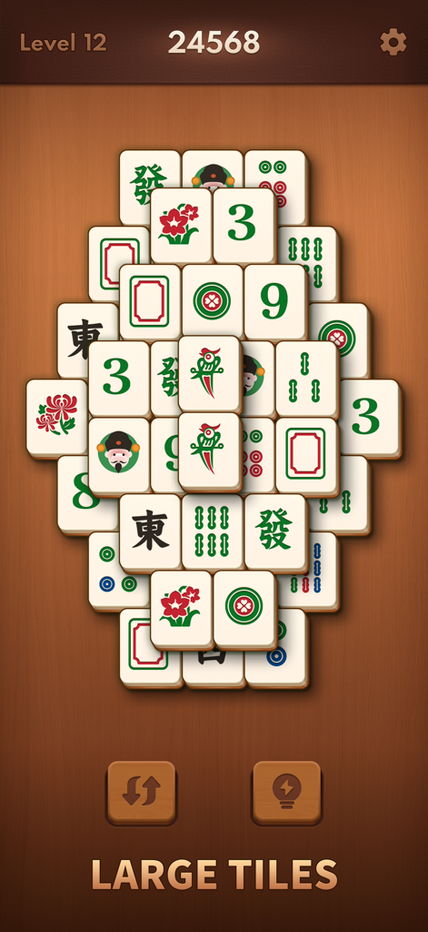 Mahjong Blast gameplay screen showing large tiles for seniors on a wooden background