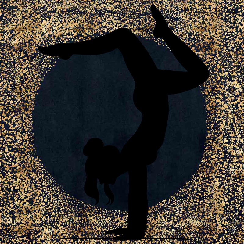 a woman doing a handstand