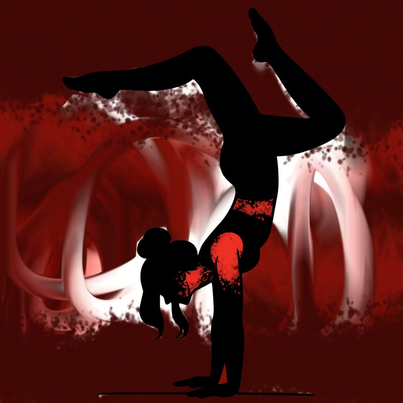 a woman doing a handstand