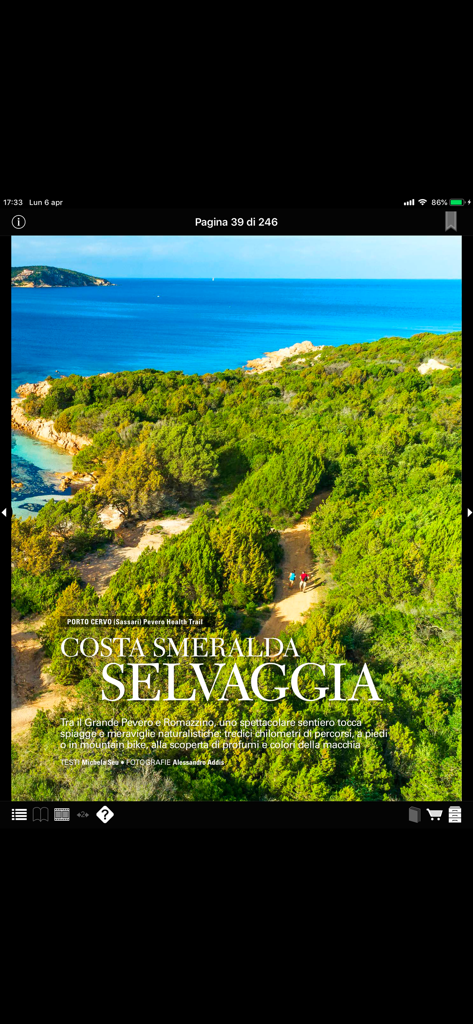 Bell'Italia - Digital magazine page showing the lush green coastline and blue sea of Costa Smeralda in Sardinia