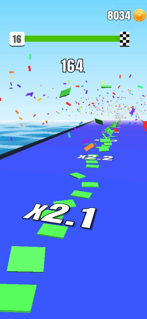 Stack Colors! - Captura de pantalla de la jugabilidad de Stack Colors de Voodoo que muestra bloques verdes volando en una pista azul con multiplicadores de puntuación