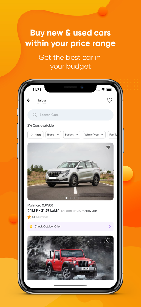 CarDekho app showing Mahindra car listings and prices in Lakhs