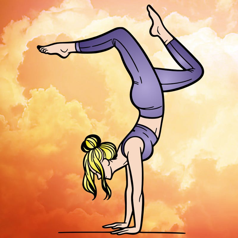 a woman doing a handstand