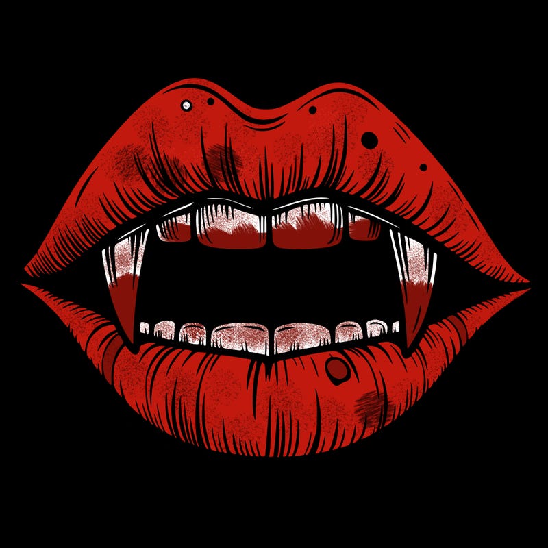 lips with vampire teeth
