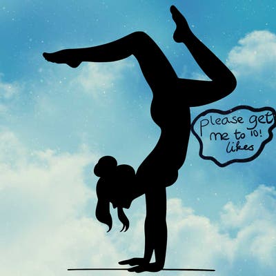 a woman doing a handstand