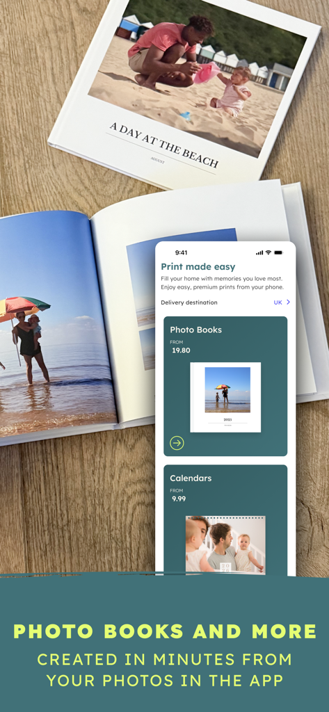 Physical family photo books on a wooden table with a smartphone showing the BackThen app ordering interface for custom prints