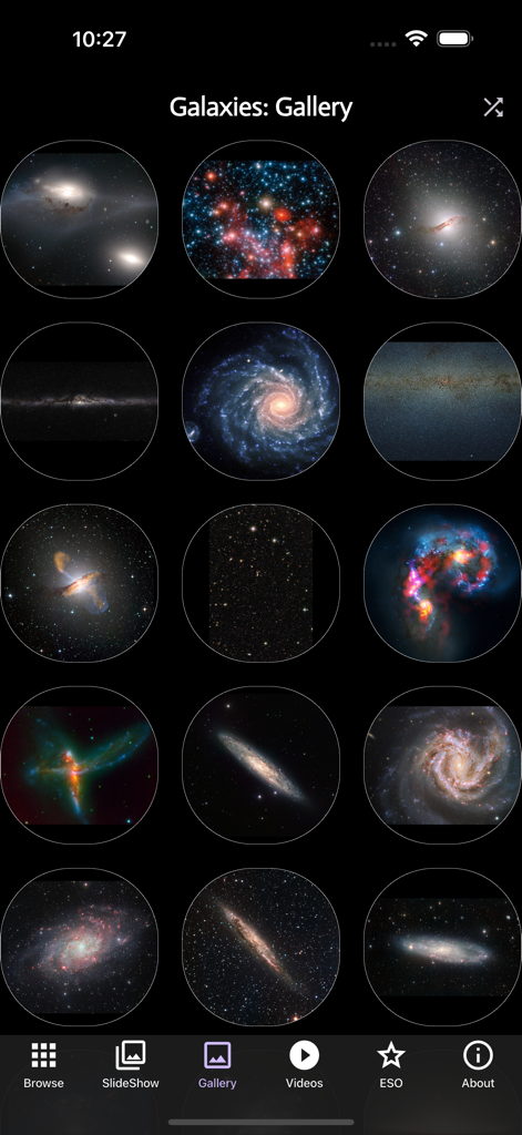 Galaxies: Spectacular - Uma grade de imagens circulares de galáxias na visualização de galeria do aplicativo Galáxias Espetacular.