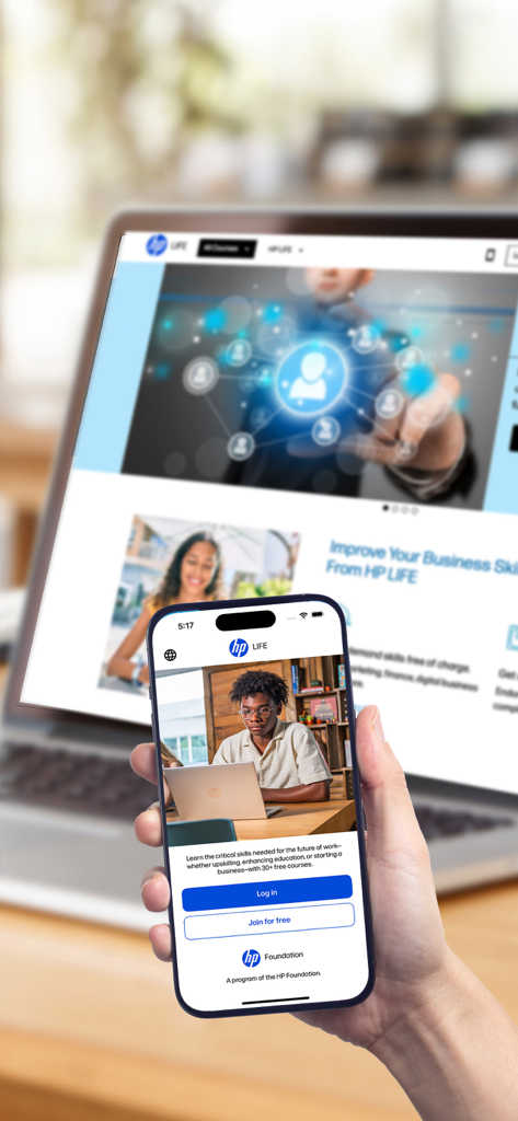 HP LIFE - A person holding a smartphone showing the HP LIFE app login screen with a laptop in the background