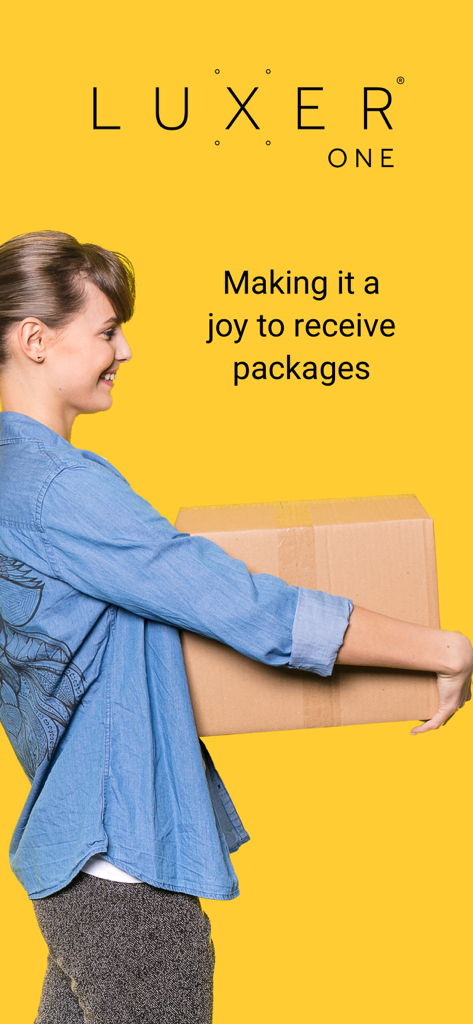 Luxer One - A woman smiling while holding a cardboard package with the Luxer One logo and slogan Making it a joy to receive packages