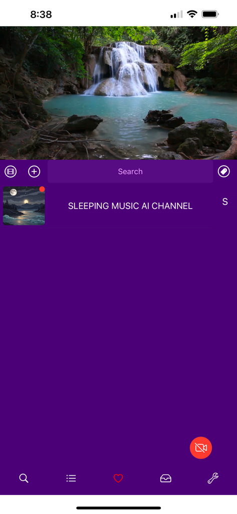 Interface of BluePlayer app playing a waterfall video on a purple themed background