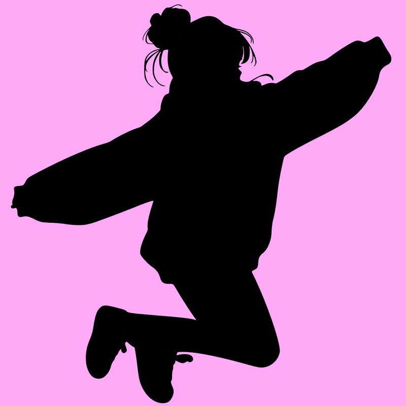 realistic girl jumping with a bun and oversized sweatshirt