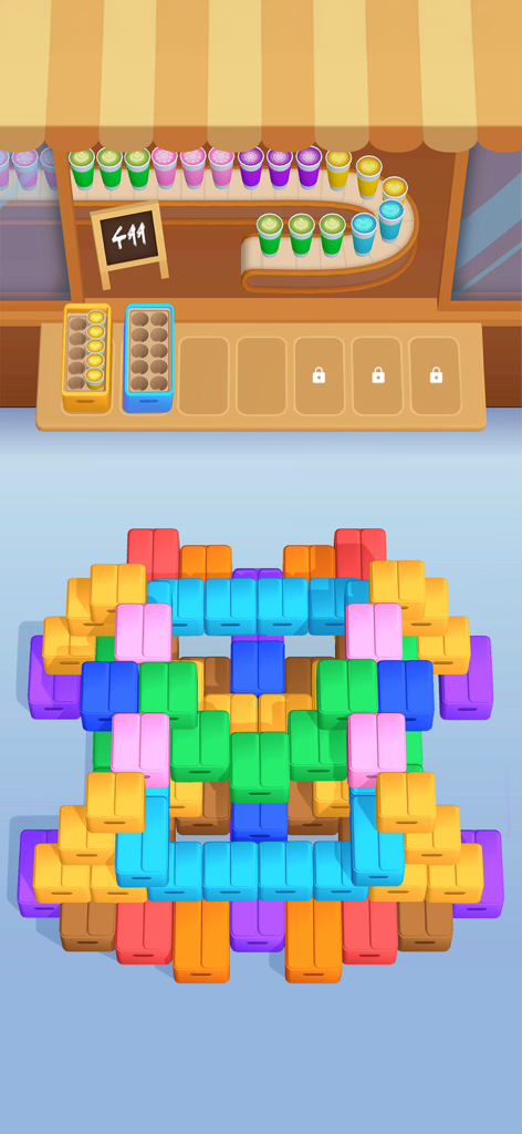 Coffee Craze - A colorful mobile puzzle game screen showing a stack of coffee boxes to be sorted into a café counter.