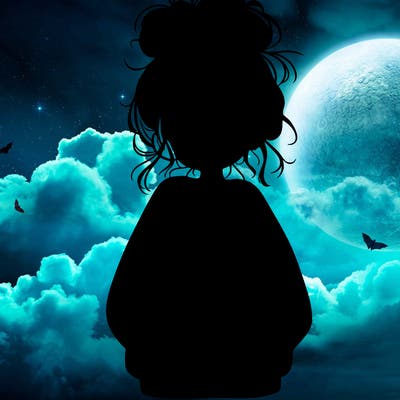 girl with baggy sweatshirt and messy bun