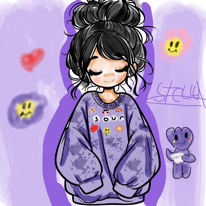 girl with baggy sweatshirt and messy bun