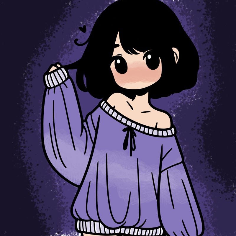 girl in baggy sweater hanging off her shoulder