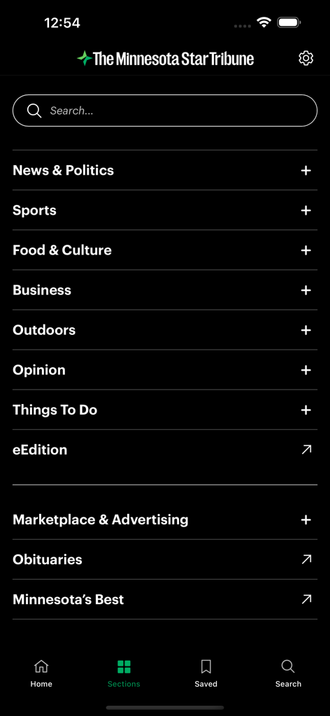The Minnesota Star Tribune - The Minnesota Star Tribune app sections menu displaying news categories like sports politics and culture