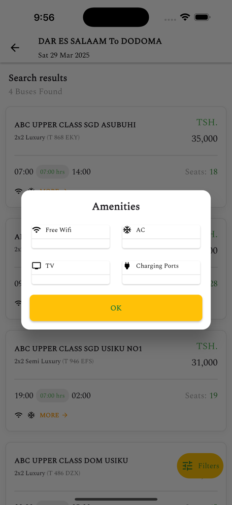 Abc Upper Class Bus - Amenities window in the Abc Upper Class Bus app showing available features like free wifi, air conditioning, TV, and charging ports.