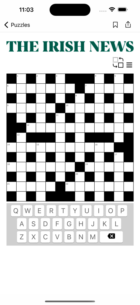 The Irish News Digital Edition - A digital crossword puzzle interface within The Irish News app featuring a full grid and mobile keyboard