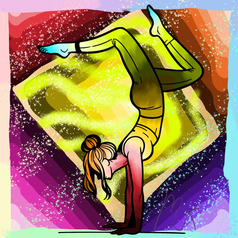 a woman doing a handstand