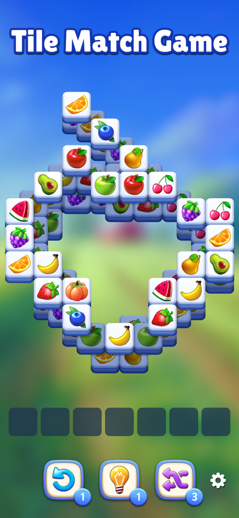 Gameplay screen of Fruit Match showing 3D fruit tiles on a puzzle board