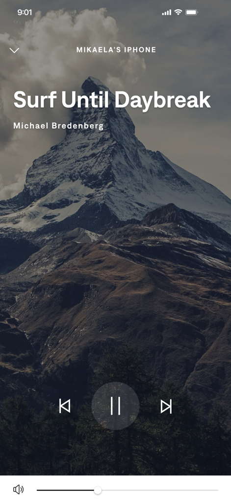 Bose Connect app music player interface with playback controls and mountain background