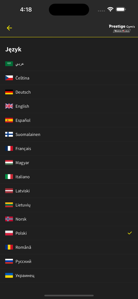 Language selection screen in the Prestige Gyms app showing a list of languages with corresponding national flags.