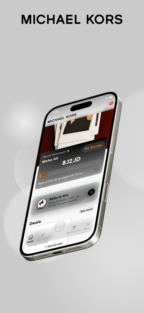 MICHAEL KORS REWARDS - Michael Kors Rewards app screen showing member points and loyalty status on a smartphone