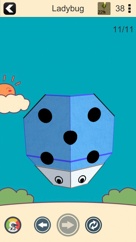 Finished 3D origami ladybug model on step 11 of a folding tutorial