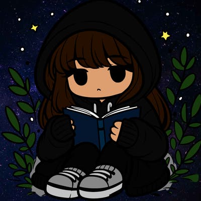 girl in oversized hoodie reading a book