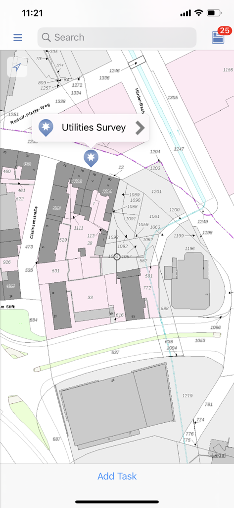A 2D map view in the GeoAce app showing a utilities survey project on a detailed cadastral map.
