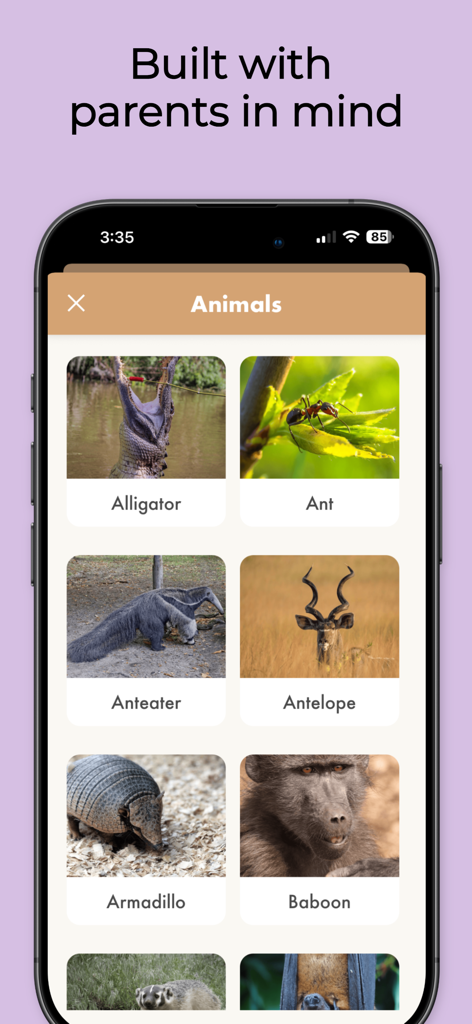 Kids Dictionary School Edition - Kids Dictionary app interface showing a grid of animals with names and high quality photos