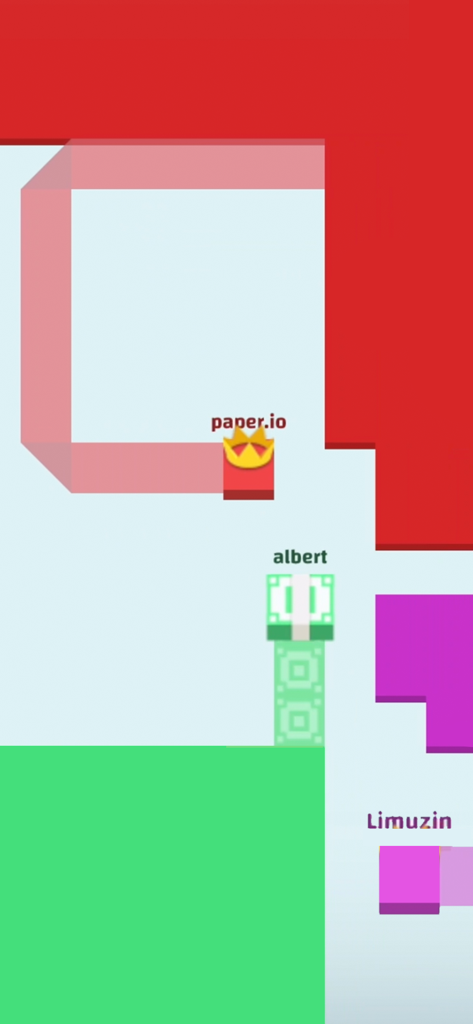 Gameplay of Paper io showing players conquering territory and capturing space with colorful trails