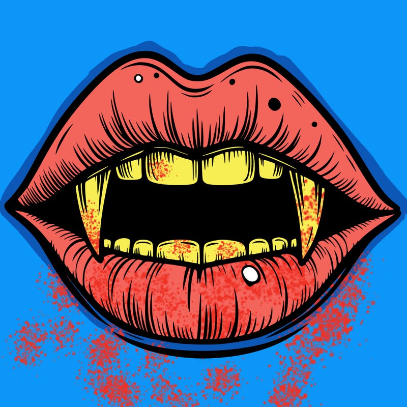 lips with vampire teeth