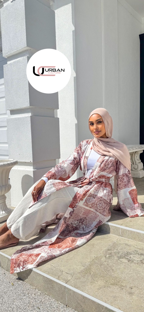 Urban Culture - Young woman wearing a stylish beige hijab and patterned modest outfit representing Urban Culture